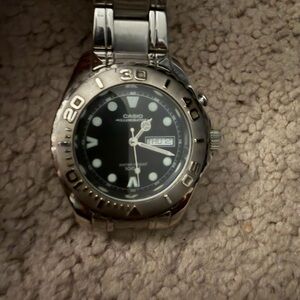 Casio Men's Silver Watch with Black Dial and Stainless Bracelet